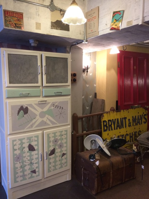 Painted cupboard, antique trunk and signs