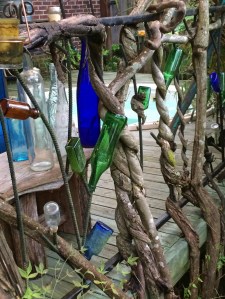Rebar fence with vine and bottles
