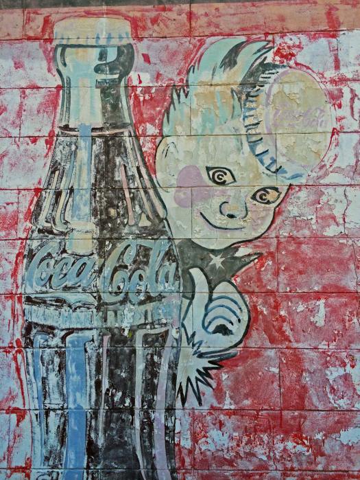 Faded Coca-cola advertising mural with the Sprite Boy at Vicksburg, ms