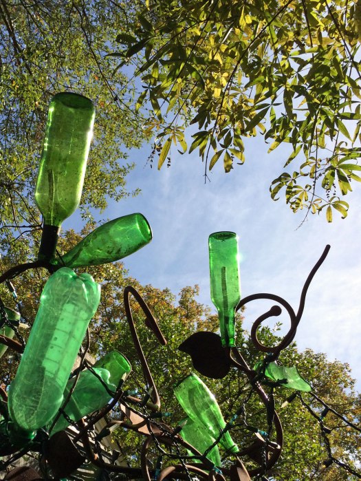 Green bottle tree sconce by Stephanie Dwyer