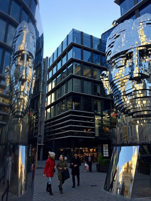 Franz Kafka's head sculpture with reflection