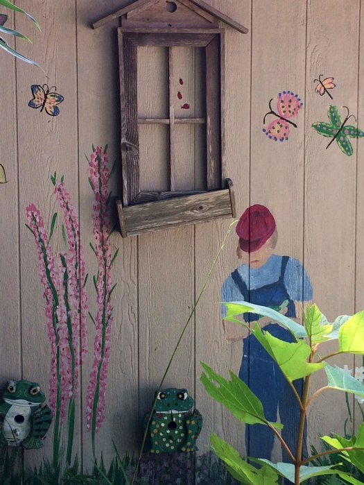 Painting of Peck on the garden outhouse