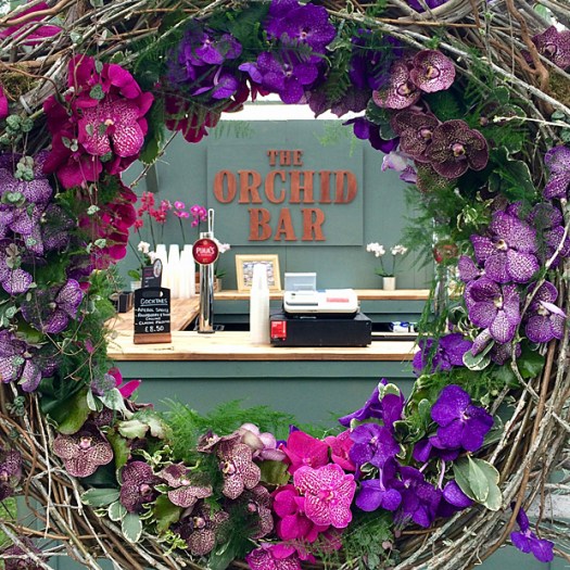 A porthole, decorated with orchids