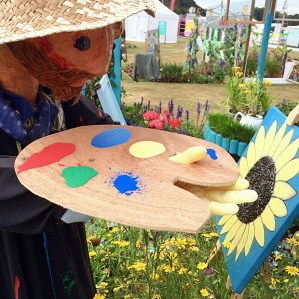 Figure of the painter with paint palette and easel