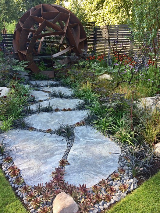 Cross-sections of a boulder fitted together to make a path