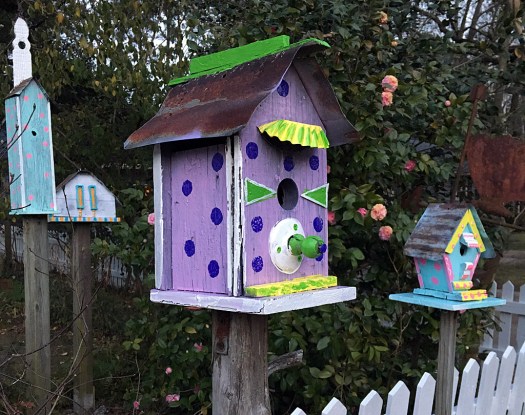 Polka dot birdhouse with tin roof