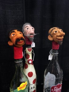 Bottle stoppers with felt faces