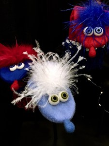 Glove style hand puppets with large round eyes