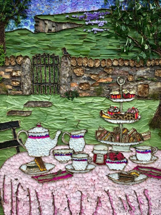 Table set for afternoon tea made from flower petals and seeds