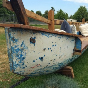 Canoe bench detail showing the distressed paintwork