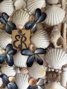 Queen Mother insignia with shells