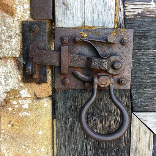 Blacksmith style handle, latch and bolt on an exterior door