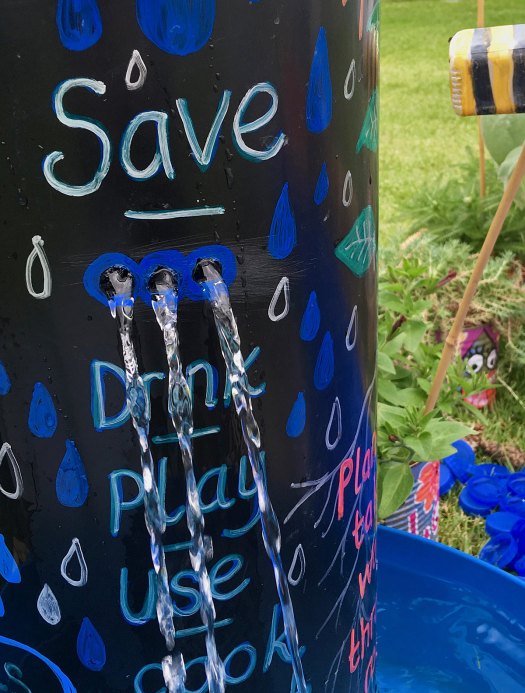 School garden water feature with conservation messages