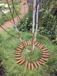 Silver birch circled by a pine cone mandala