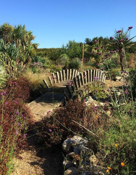 Arched wooden bridge with spiky uprights