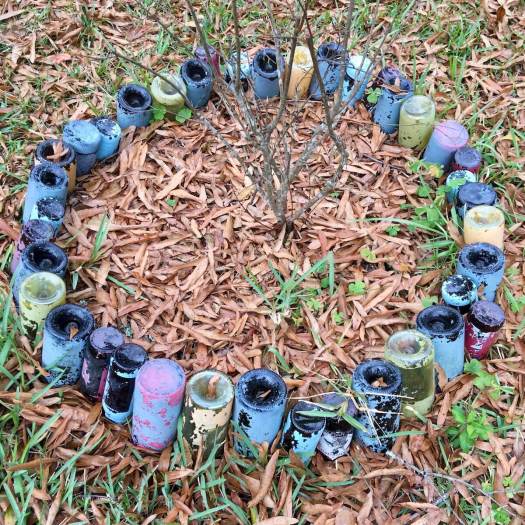 Plant edged with upturned bottles