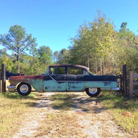Vintage car used to make a fence