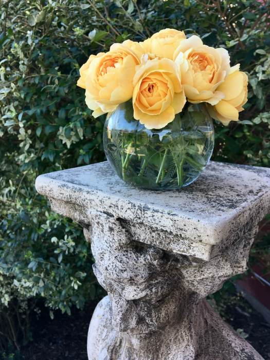 Rose posy on a decorative plinth
