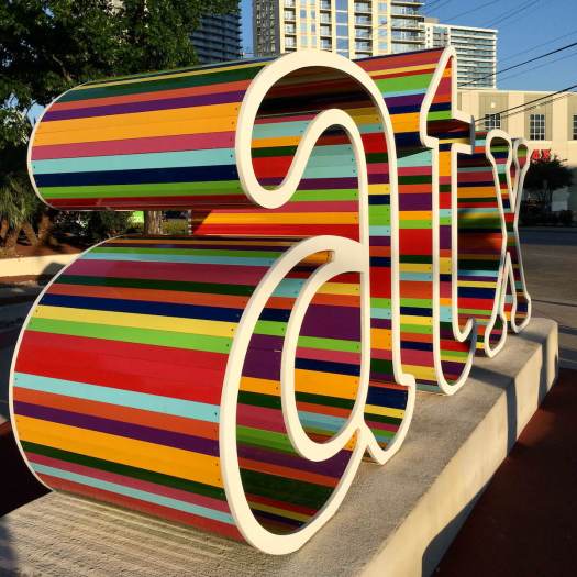 Whole Foods rainbow coloured atx logo in Austin