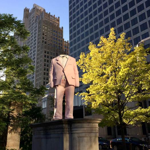 Pink business suit sculpture by Erwin Wurm