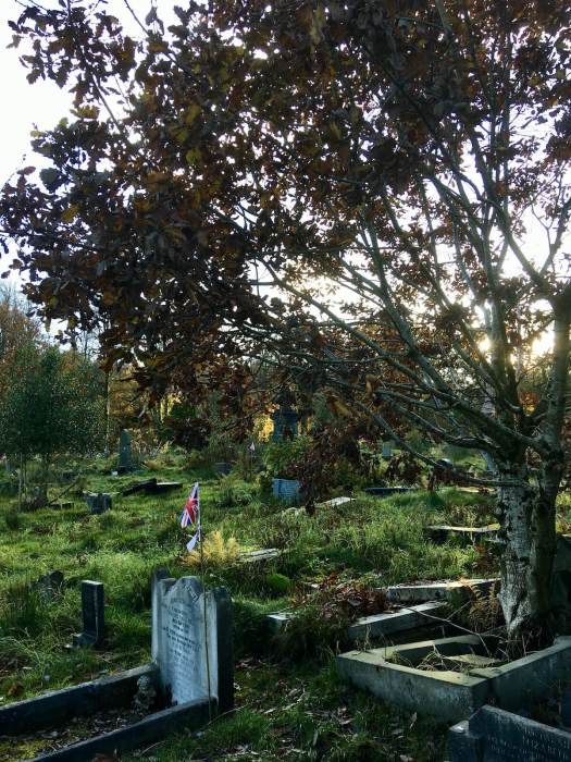 War Grave in Darwen Cemetery marked with a remembrance flag