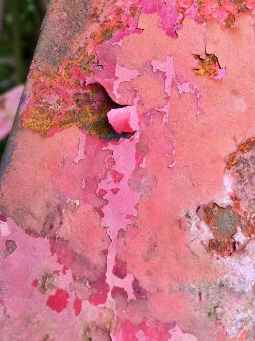 Distressed textures: many colours revealed in flaking metal