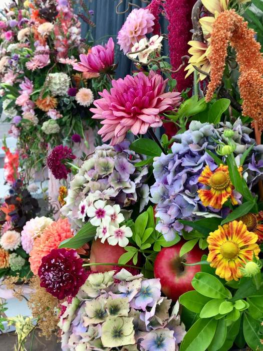 Arrangement of garden flowers: hydrangea, dahlia, phlox, helenium, scabious, sunflower, amaranthus
