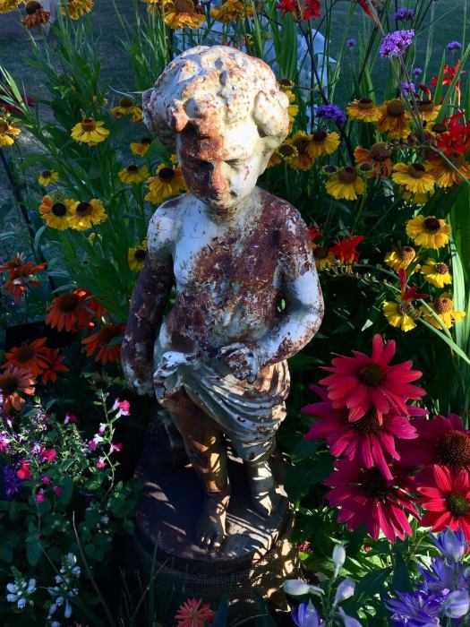 Statue in flowers