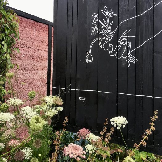 Artwork showing a bunch of flowers being offered to a centipede