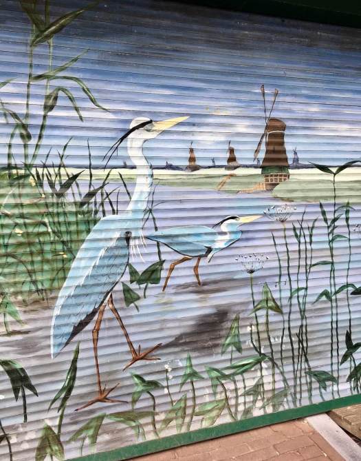 Painting of waterbirds and windmill