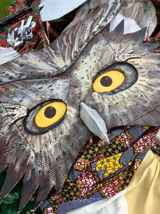 Owl puppet costume on the ground