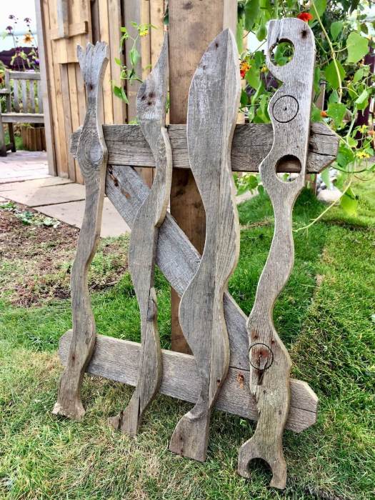 Wooden gate with quirky, wavy posts