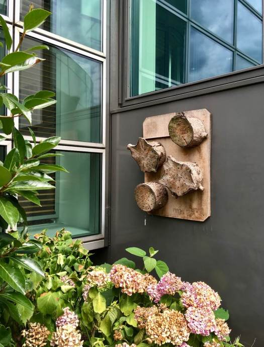 Insect hotel made out of slices of tree trunk