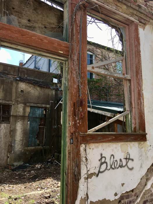 Blest written on a derelict building