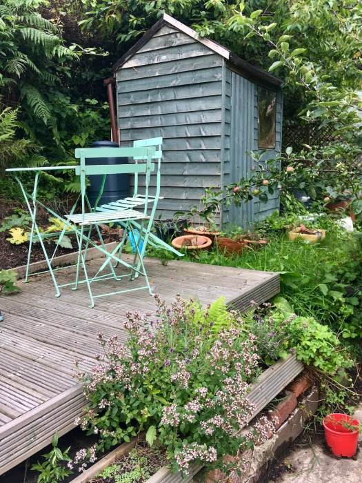 Garden shed with table and chairs