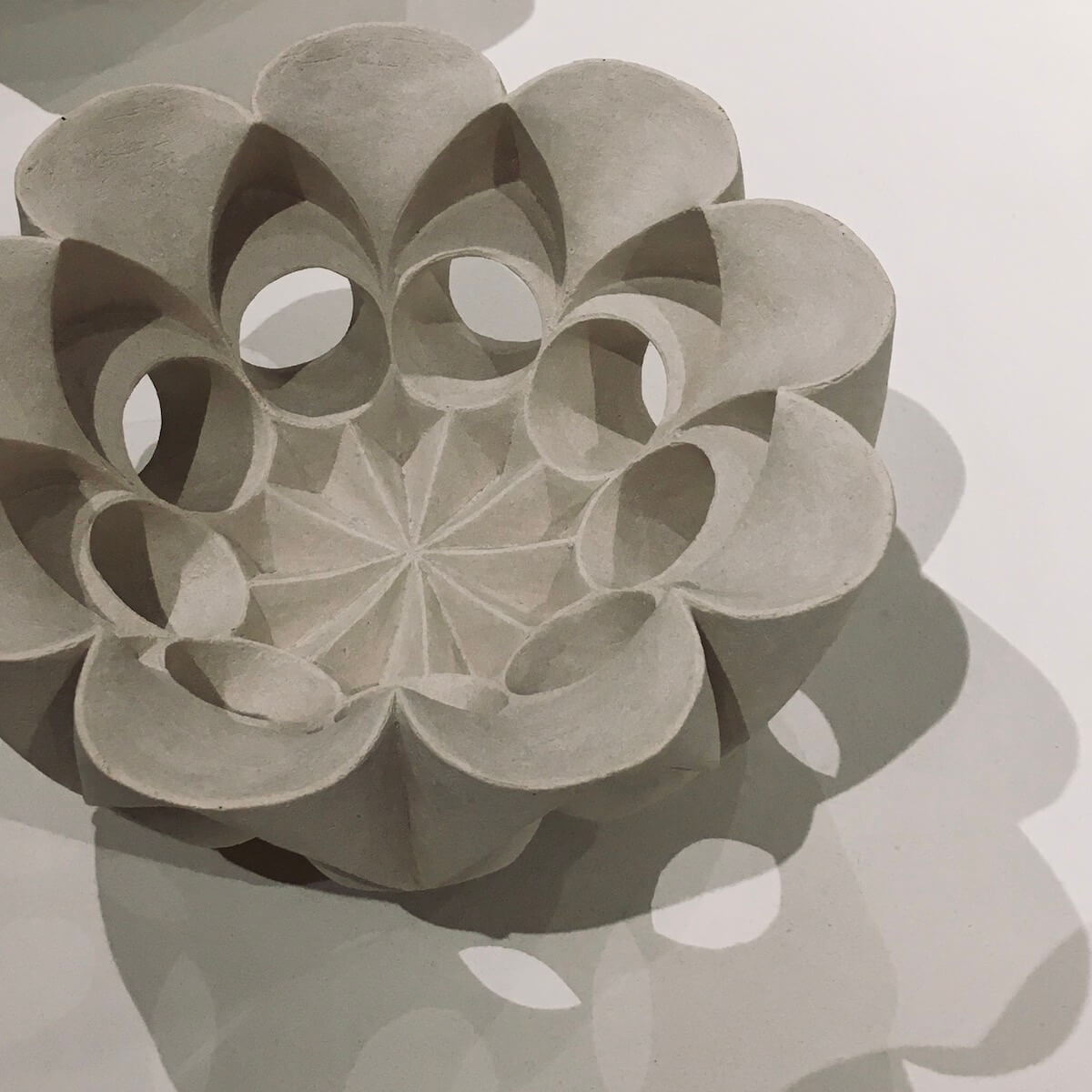 Hamila Cassell's ceramic bowl with bold, geometric design and shadow effects