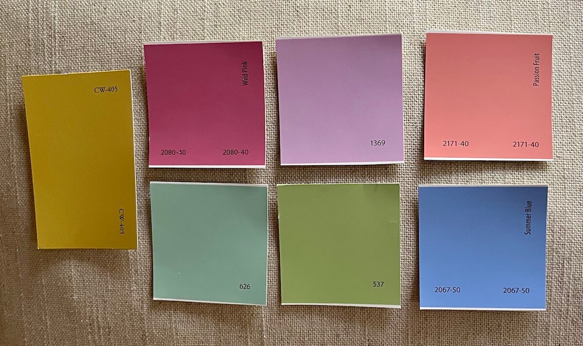 Benjamin Moore paint chips laid out on a cushion